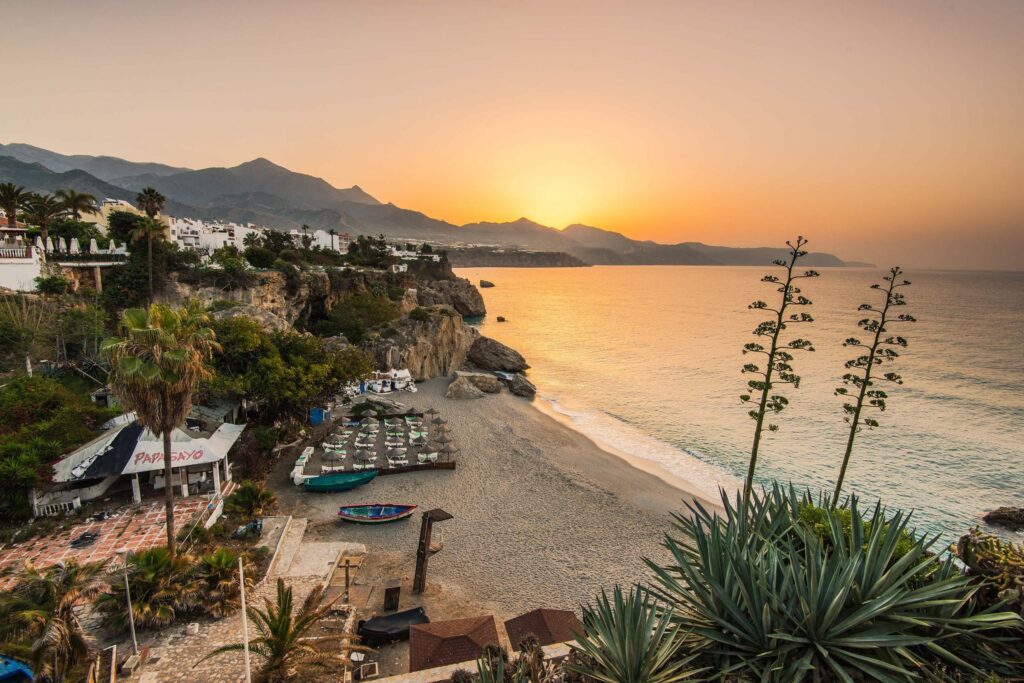 beautiful sunrise over beach in nerja,andalusia,spain
